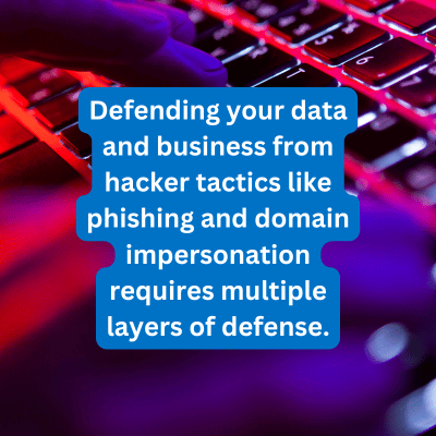 a hand on a keyboard with text overlay that reads Defending your data and business from hacker tactics like phishing and domain impersonation requires multiple layers of defense.